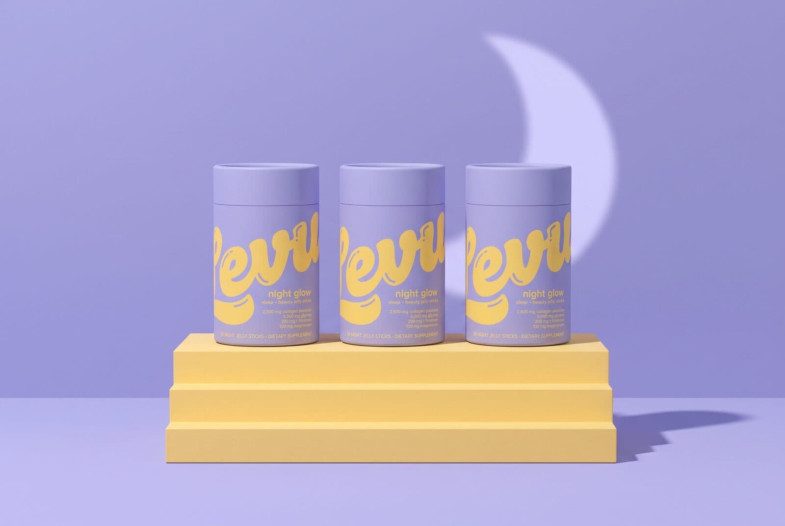 Three Night Glow tubes on a yellow plinth